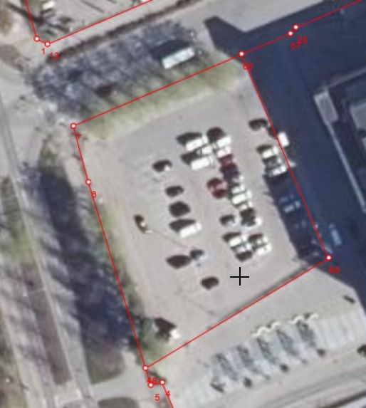 Karttakuva, jossa näkyy parkkipaikan kiinteistön rajat